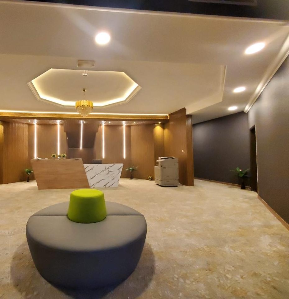 Finished office reception with feature ceiling, a commercial fit out in Dubai